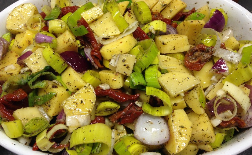 Geschmorte Lauch Kartoffeln mit getrockneten Tomaten , Kräutern und Safranhonig