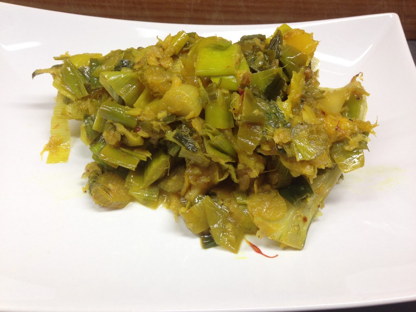 Gebackener gefüllter Fenchelmit Lauch und Mango