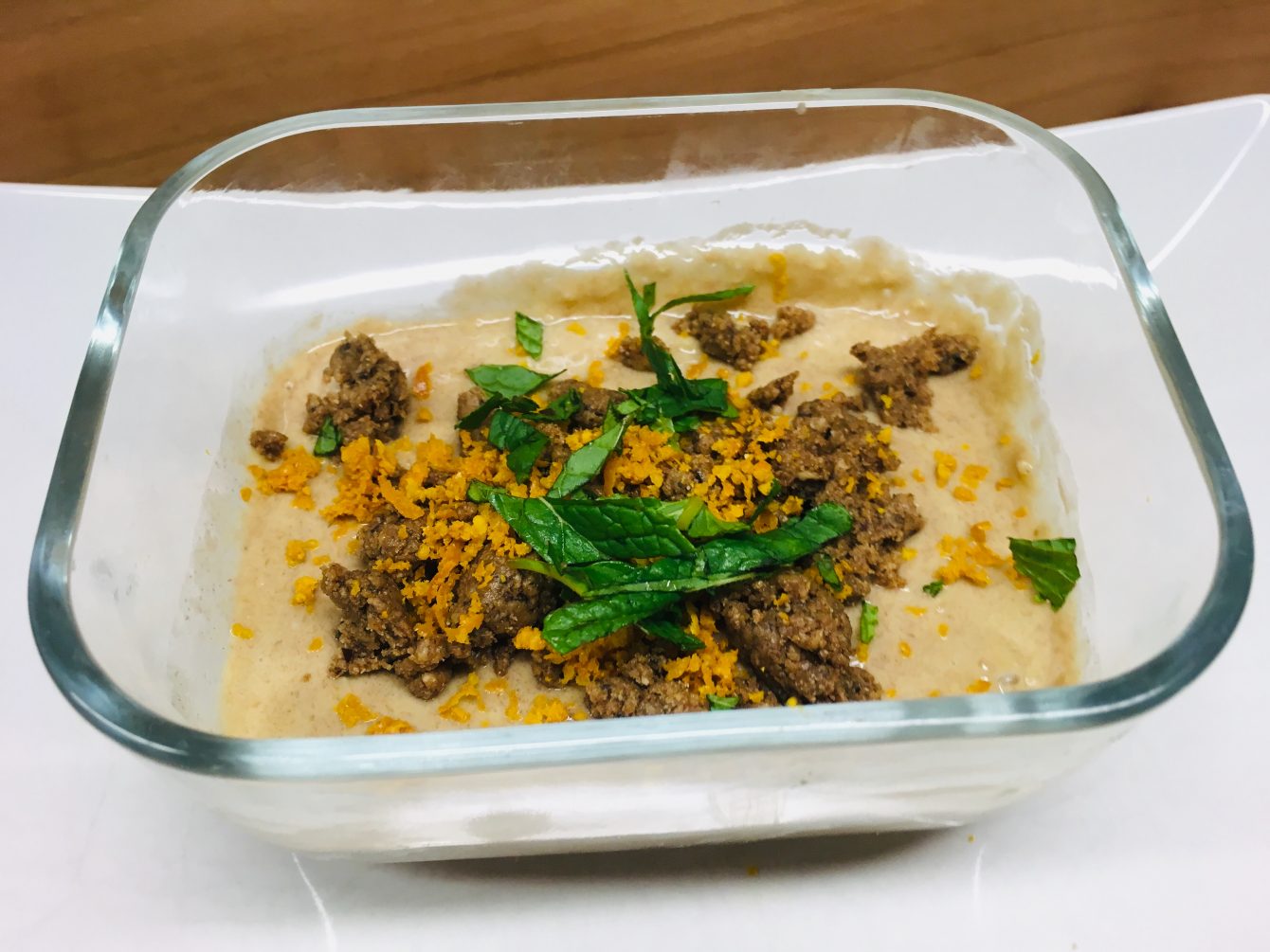 Kaki Cashew Creme mit Mohnstreusel